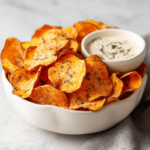 Gluten Free Chips: Snack Without the Worry 6 Crispy homemade gluten free chips in ceramic bowl