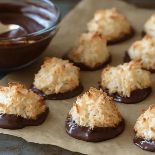 Delicious chocolate-dipped coconut macaroons from a classic coconut macaroons recipe.